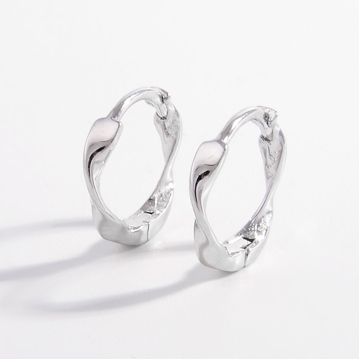 Nina | Twist Hoop Earrings - Silver - 100500868852677 - Jewellery - Ivory & White